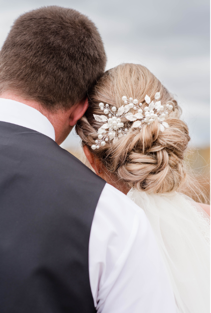 wedding couple looking at the view  near Swanage Dorset